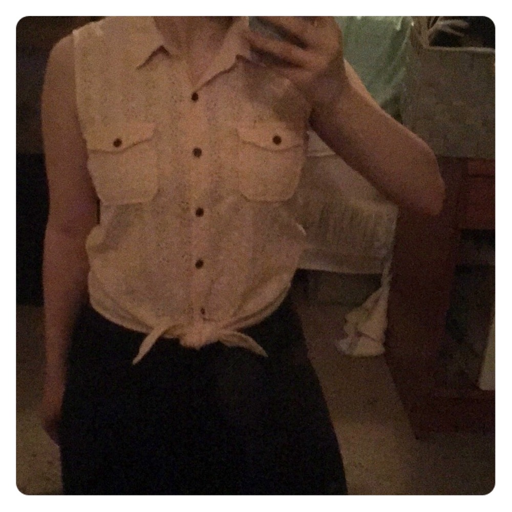 Light pink button down top with flower designs